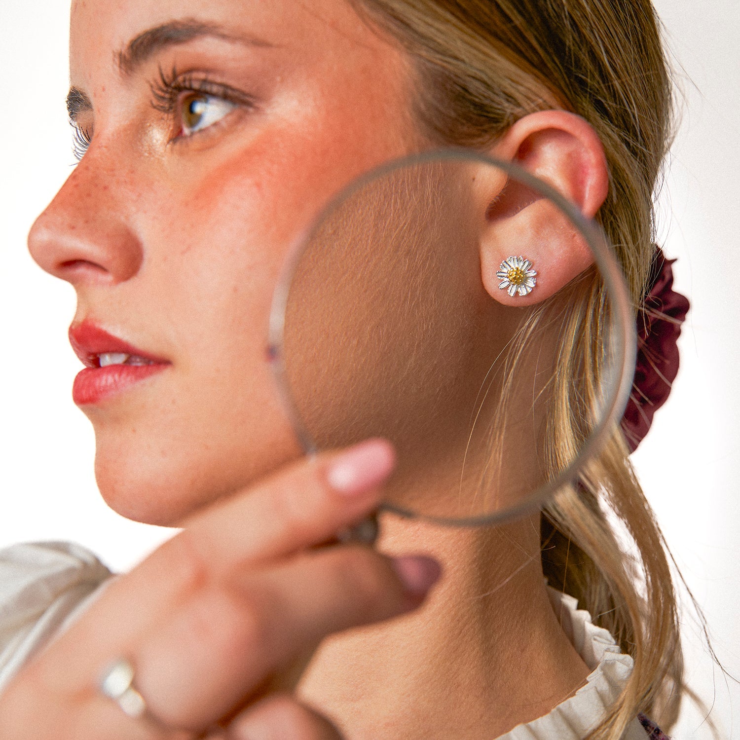 Brincos Daisy